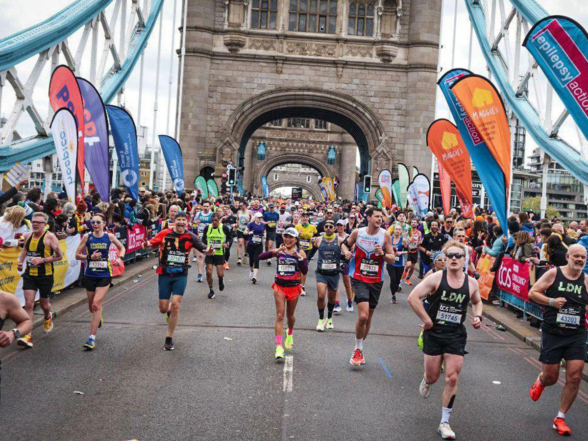 London Marathon runners crossing Tower Bridge