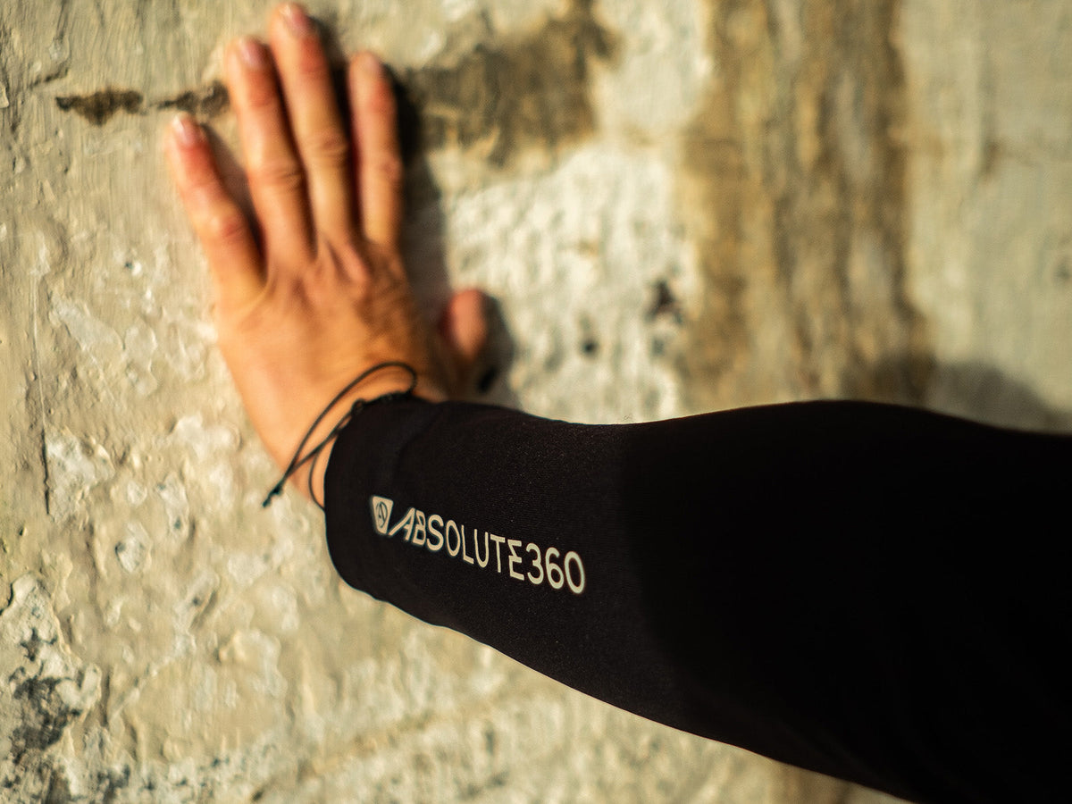 Runner pausing against a wall during training to recover after exercise