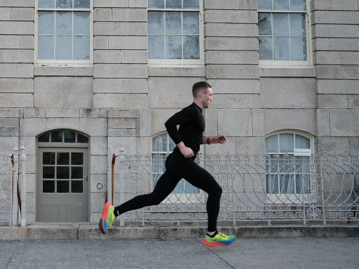 Runner in mid-stride during plyometric training