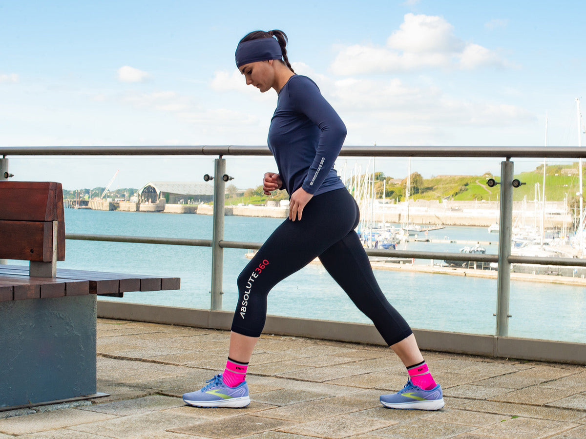 Runner stretching after exercise during a post-workout recovery routine