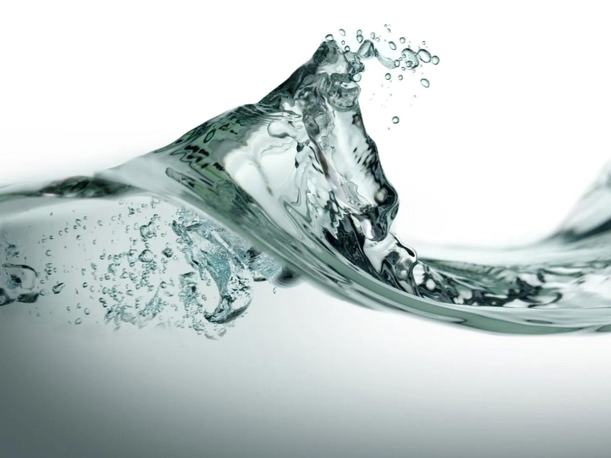 Water splash representing hydration and the importance of water for the human body