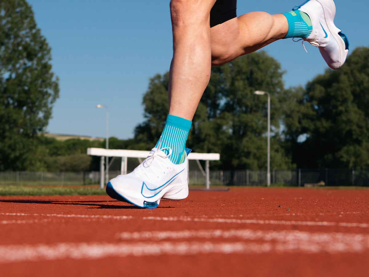 Runner wearing ABSOLUTE360 technical performance running socks