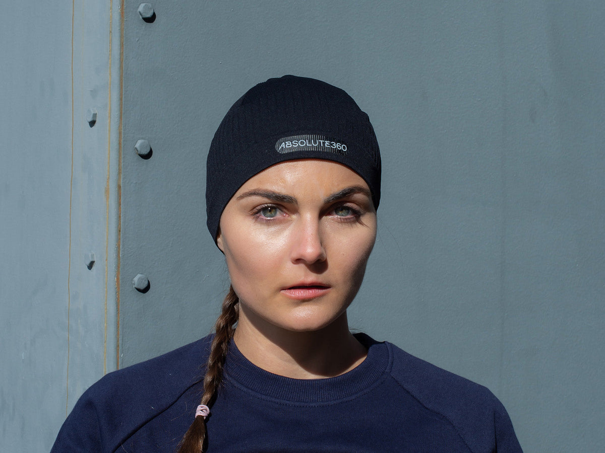 Woman wearing an ABSOLUTE360 technical skull cap