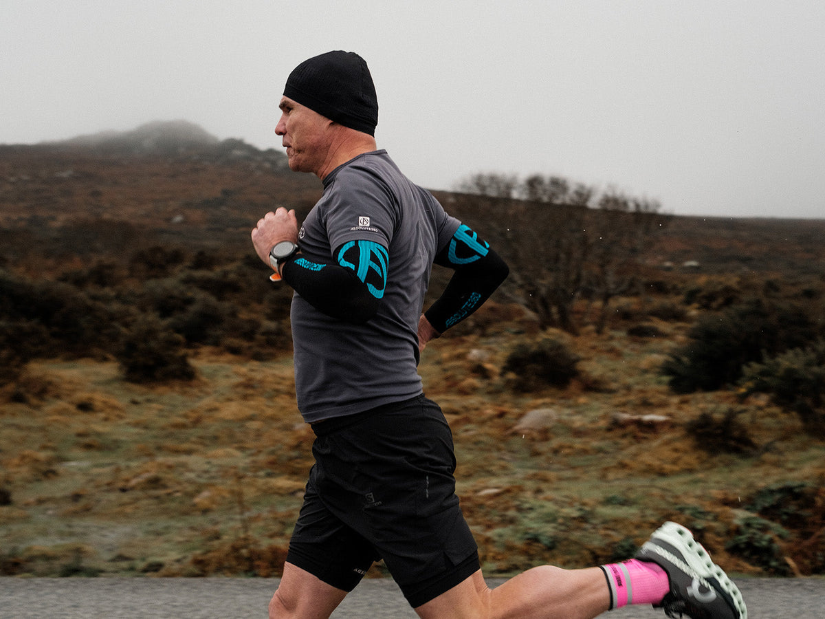 Runner wearing layers for cold weather winter running