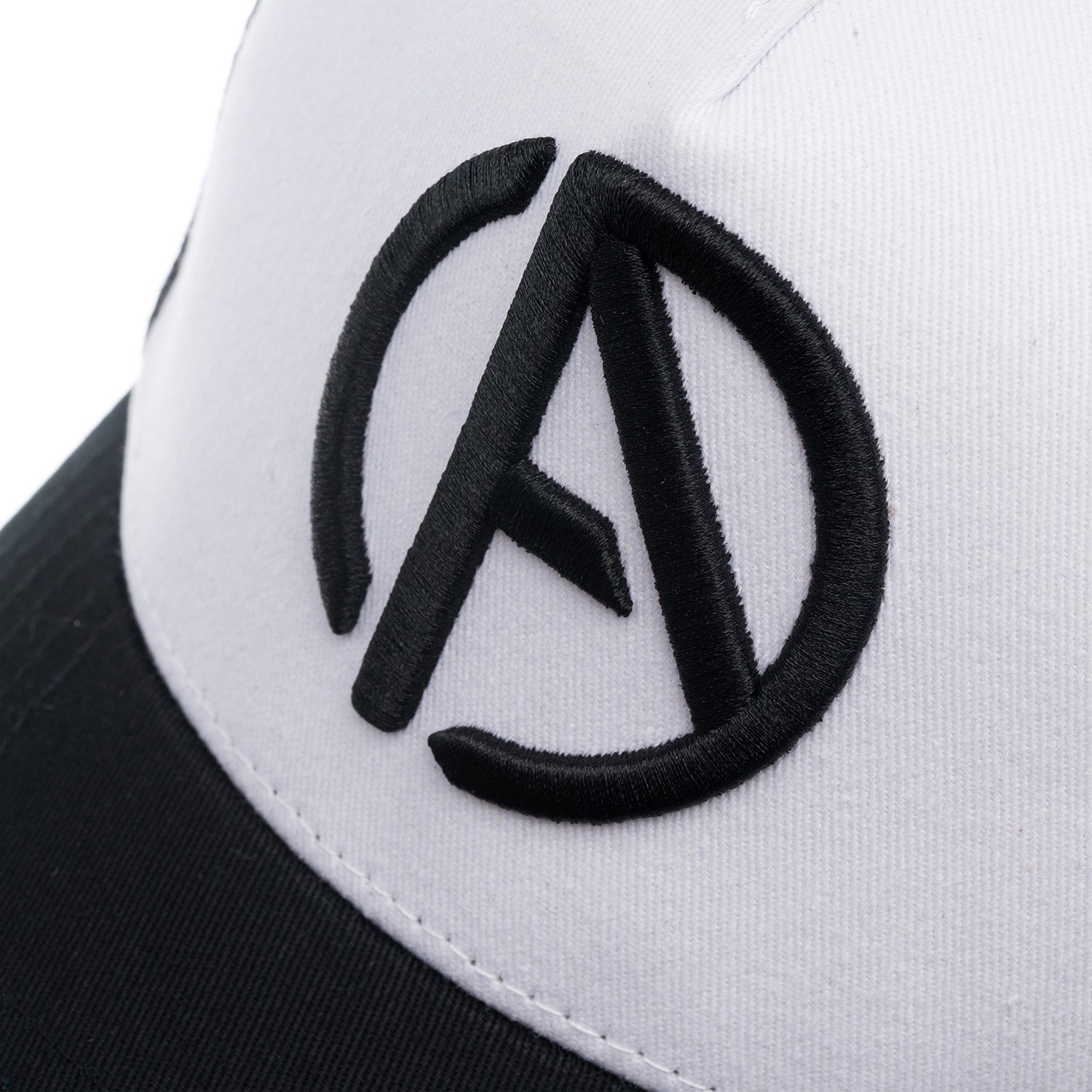 ABSOLUTE360 Logo Trucker Hat in white with black mesh, detailed embroidered logo