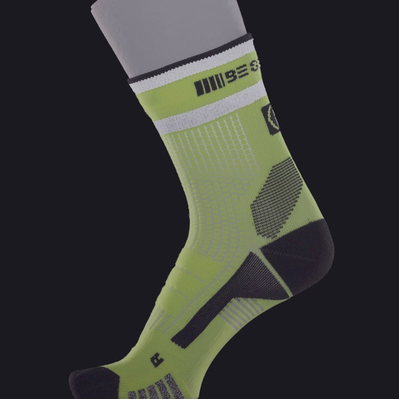 ABSOLUTE360 neon yellow high-vis quarter running sock, product video on black background